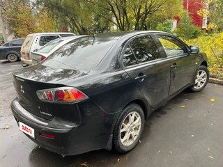 2012 Mitsubishi Lancer X Рестайлинг, чёрный, 590000 рублей, вид 1
