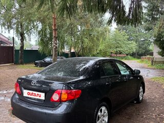 2006 Toyota Corolla X (E140, E150), чёрный, 560000 рублей, вид 3