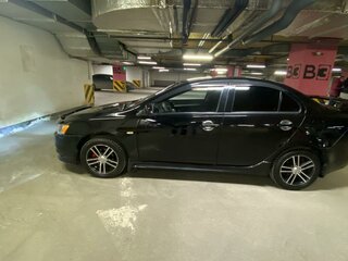 2011 Mitsubishi Lancer X Рестайлинг, чёрный, 870000 рублей, вид 2