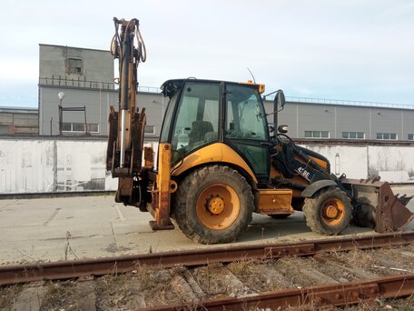 2006 Caterpillar 428, жёлтый, 3700000 рублей, вид 4