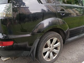 2010 Mitsubishi Outlander II Рестайлинг, чёрный, 900000 рублей, вид 3