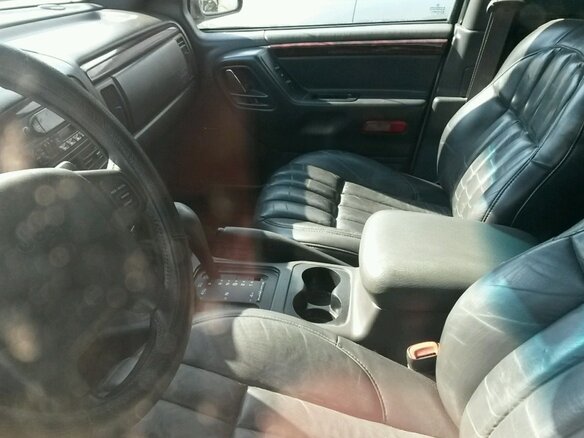 2000 Jeep Grand Cherokee II (WJ), серебристый - вид 2