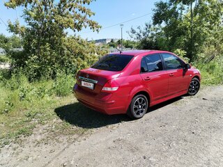 2013 Nissan Tiida I Рестайлинг, красный, 960000 рублей, вид 4