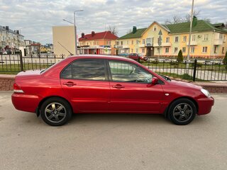 2009 Mitsubishi Lancer Classic IX Рестайлинг, красный, 630000 рублей, вид 4