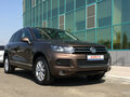 2014 Volkswagen Touareg II, коричневый - вид 2