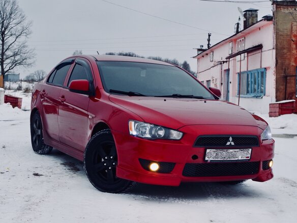 2007 Mitsubishi Lancer X, красный - вид 5