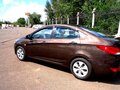 2016 Hyundai Solaris I Рестайлинг, коричневый, 945000 рублей - вид 1
