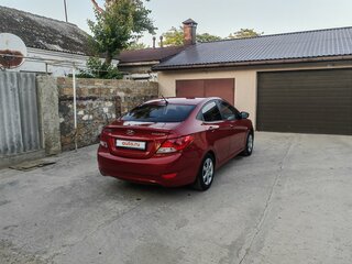 2012 Hyundai Solaris I, красный, 850000 рублей, вид 5