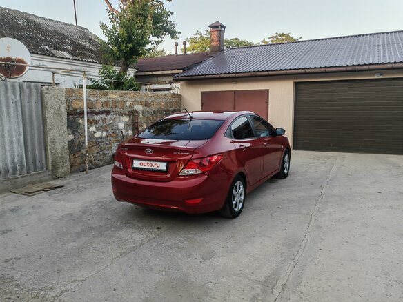2012 Hyundai Solaris I, красный, 850000 рублей - вид 4