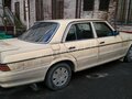 1979 Mercedes-Benz W123 200, жёлтый - вид 1