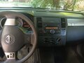 2007 Nissan Tiida I, серый, 980000 рублей - вид 5