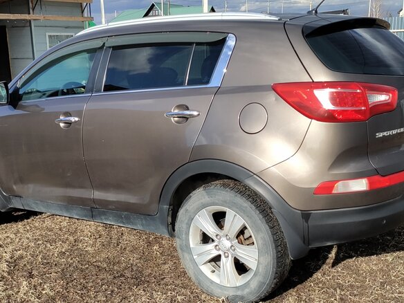 2011 Kia Sportage III, коричневый, 830000 рублей - вид 4