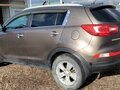 2011 Kia Sportage III, коричневый, 830000 рублей - вид 4