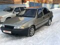 2006 Daewoo Nexia I, бежевый - вид 2