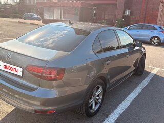2016 Volkswagen Jetta VI Рестайлинг, серый, 1370000 рублей, вид 4