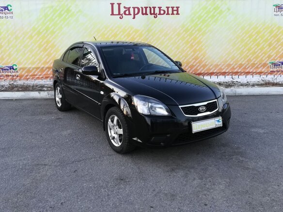 2011 Kia Rio II Рестайлинг, чёрный - вид 2