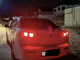 2014 Mitsubishi Lancer X Рестайлинг, белый, 650000 рублей, вид 2