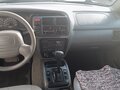 2001 Chevrolet Tracker II, серебристый - вид 4