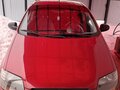 2007 Chevrolet Aveo I, красный, 385000 рублей