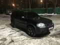 2003 Ford Maverick III, чёрный - вид 1