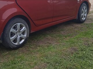 2012 Hyundai Solaris I, красный, 700000 рублей, вид 3