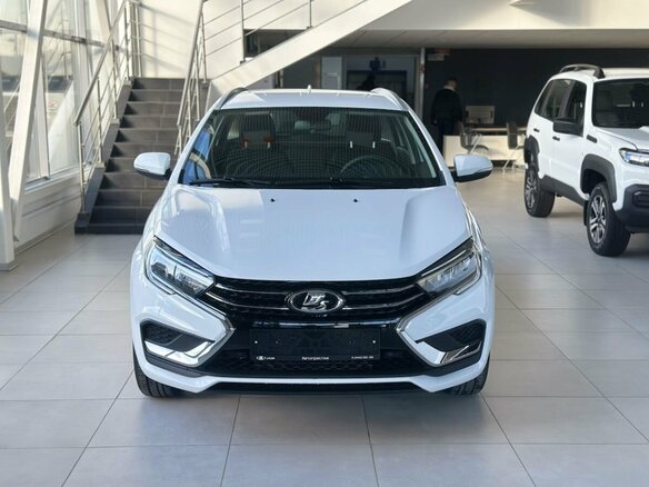 2026 Lada (ВАЗ) Vesta SW I Рестайлинг (NG), белый, 1815000 рублей - вид 1