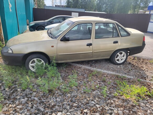 2010 Daewoo Nexia I Рестайлинг, бежевый, 299000 рублей - вид 3