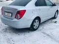 2012 Chevrolet Aveo II, серебристый, 680000 рублей - вид 6