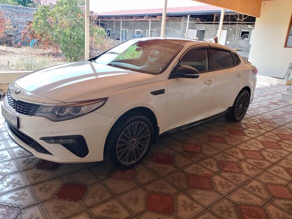 2020 Kia Optima IV Рестайлинг, белый, 1680000 рублей