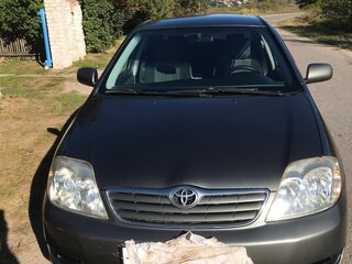 2004 Toyota Corolla IX (E120, E130) Рестайлинг, серый, 550000 рублей, вид 3