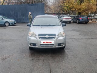2011 Chevrolet Aveo I Рестайлинг, серебристый, 280000 рублей, вид 2
