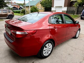 2014 Kia Rio 5-speed III, красный, 860000 рублей, вид 5