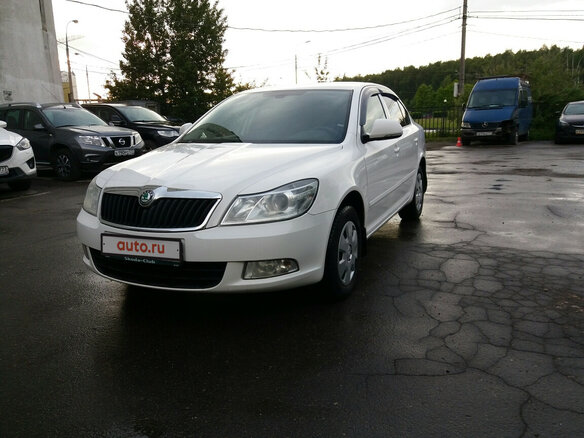 2013 Skoda Octavia II (A5) Рестайлинг, белый - вид 1