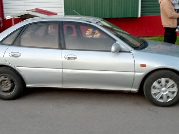 1991 Mitsubishi Mirage IV, серый, 85000 рублей - вид 5