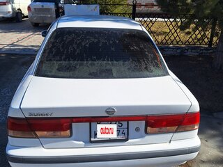 2002 Nissan Sunny B15, белый, 200000 рублей, вид 2