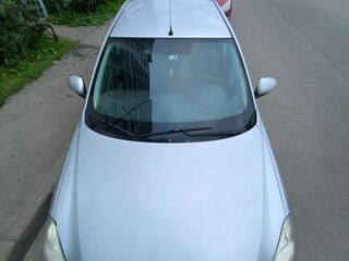 2014 Nissan Almera III (G15), серебристый, 950000 рублей, вид 2