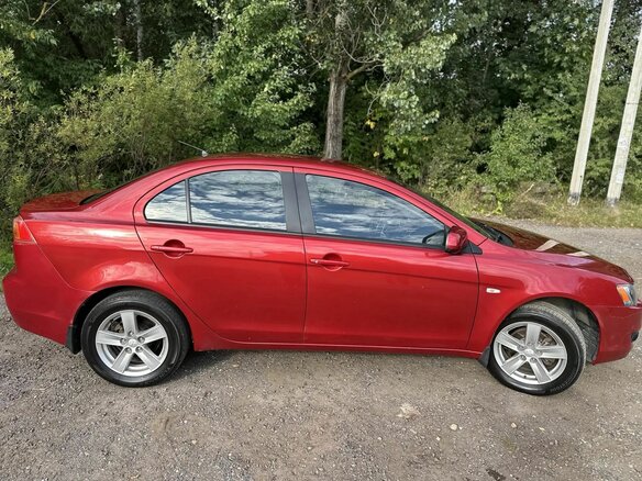 2008 Mitsubishi Lancer X, красный - вид 6