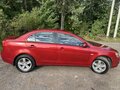 2008 Mitsubishi Lancer X, красный - вид 6