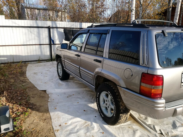 1998 Jeep Grand Cherokee I (ZJ) Рестайлинг, серебристый - вид 3