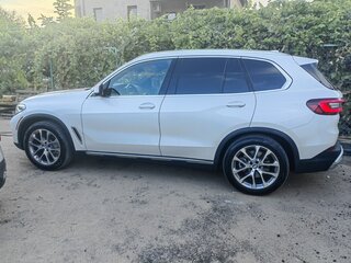 2022 BMW X5 40i IV (G05/G18), белый, 8500000 рублей, вид 2