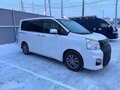 2012 Toyota Voxy II (R70) Рестайлинг, белый, 1845000 рублей - вид 5