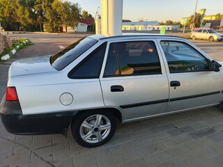 2015 Daewoo Nexia I Рестайлинг, серебристый, 315000 рублей, вид 5
