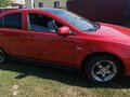 2007 Mitsubishi Lancer X, красный, 685000 рублей - вид 3