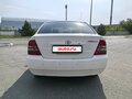 2004 Toyota Corolla IX (E120, E130), белый, 500000 рублей - вид 5