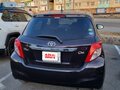 2013 Toyota Vitz III (XP130), красный, 850000 рублей - вид 7