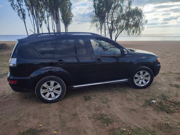 2012 Mitsubishi Outlander II Рестайлинг, чёрный, 1400000 рублей - вид 3