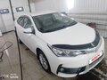 2016 Toyota Corolla XI (E160, E170, E180) Рестайлинг 1, белый, 1799000 рублей - вид 1