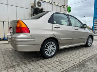 2007 Suzuki Liana I Рестайлинг, бежевый, 700000 рублей, вид 4