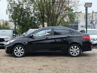 2012 Hyundai Solaris I, чёрный, 599000 рублей, вид 4
