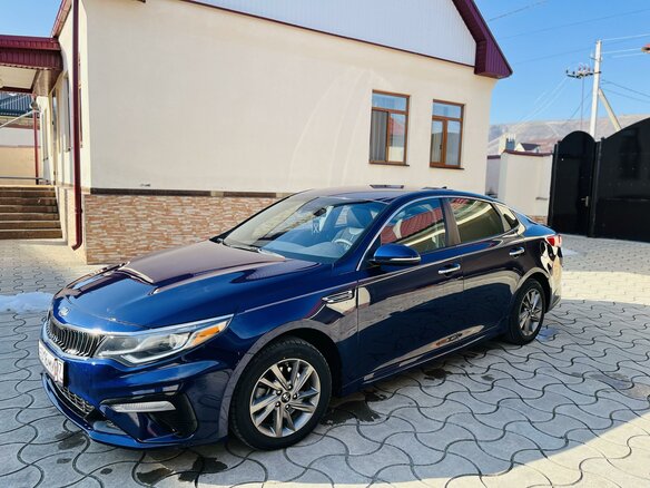 2019 Kia Optima IV Рестайлинг, синий, 2100000 рублей - вид 2